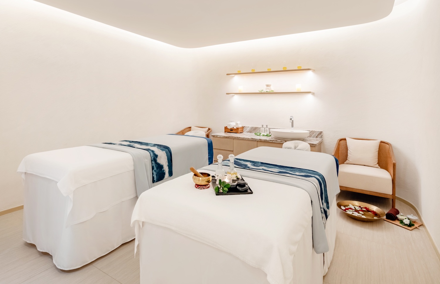 A spa and wellness room with spa beds